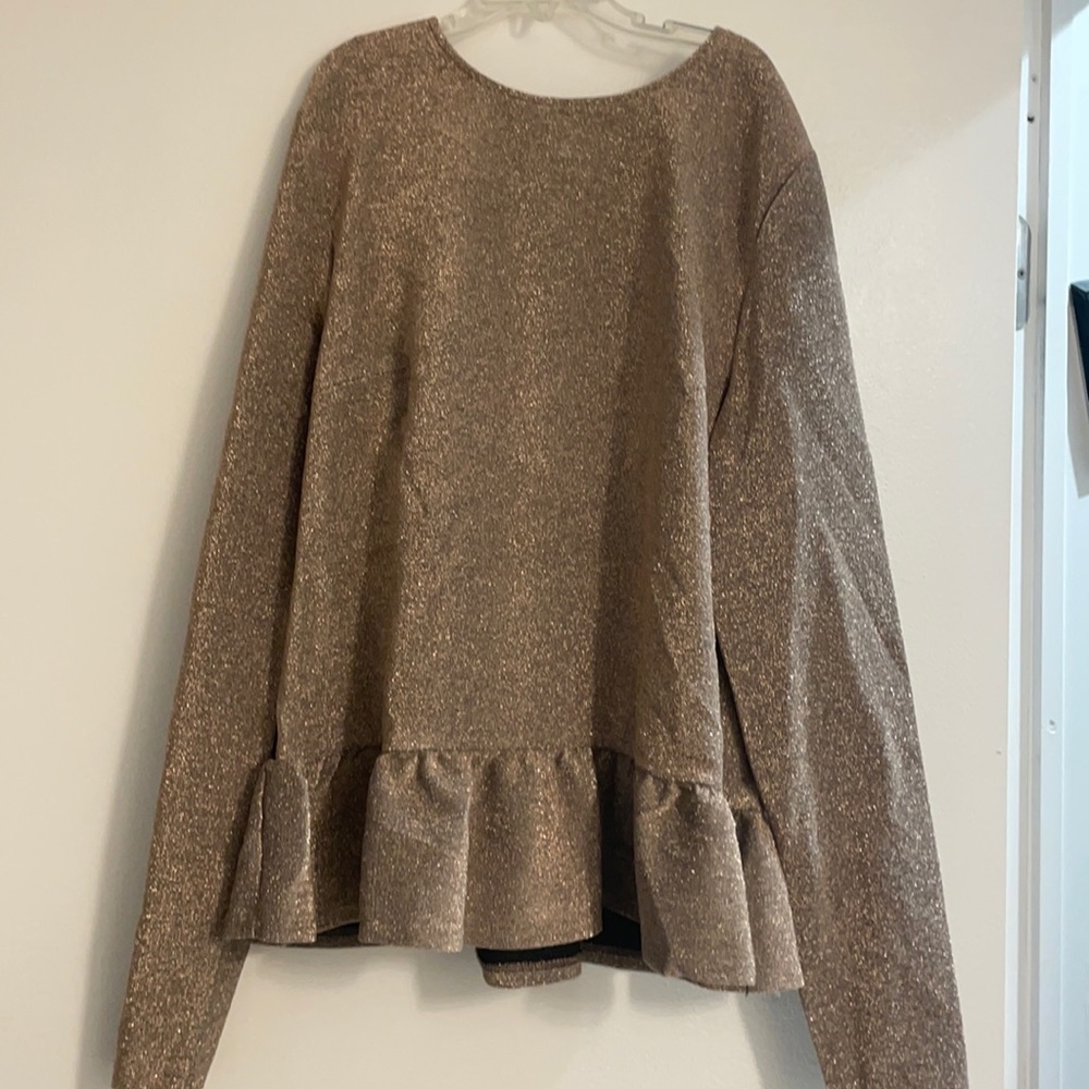 Beautiful peplum hem sweater